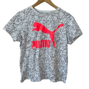 NWOT Puma t-shirt  with neon cheetah on black and white graphic pattern‎